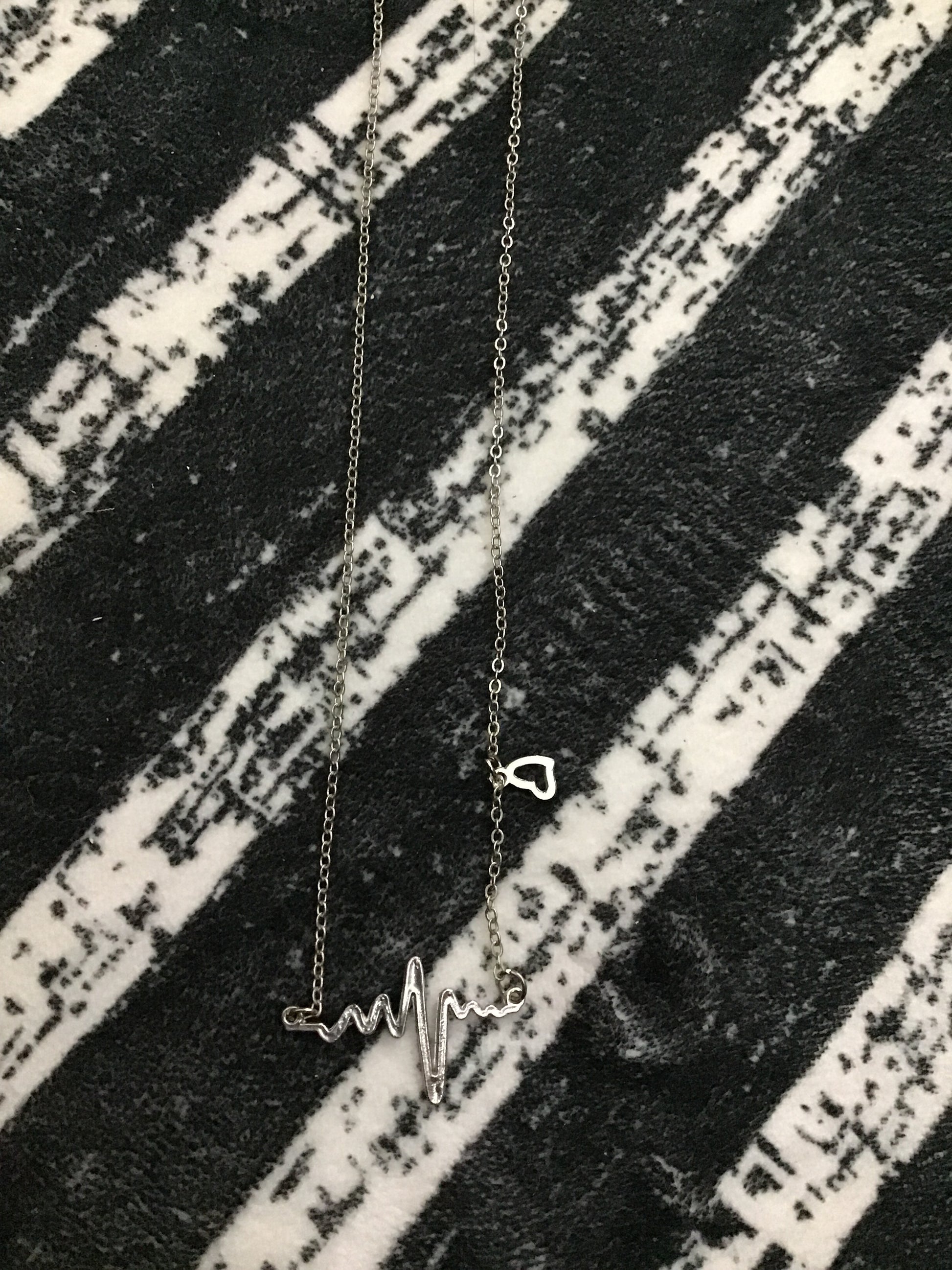 Silver heartbeat necklace