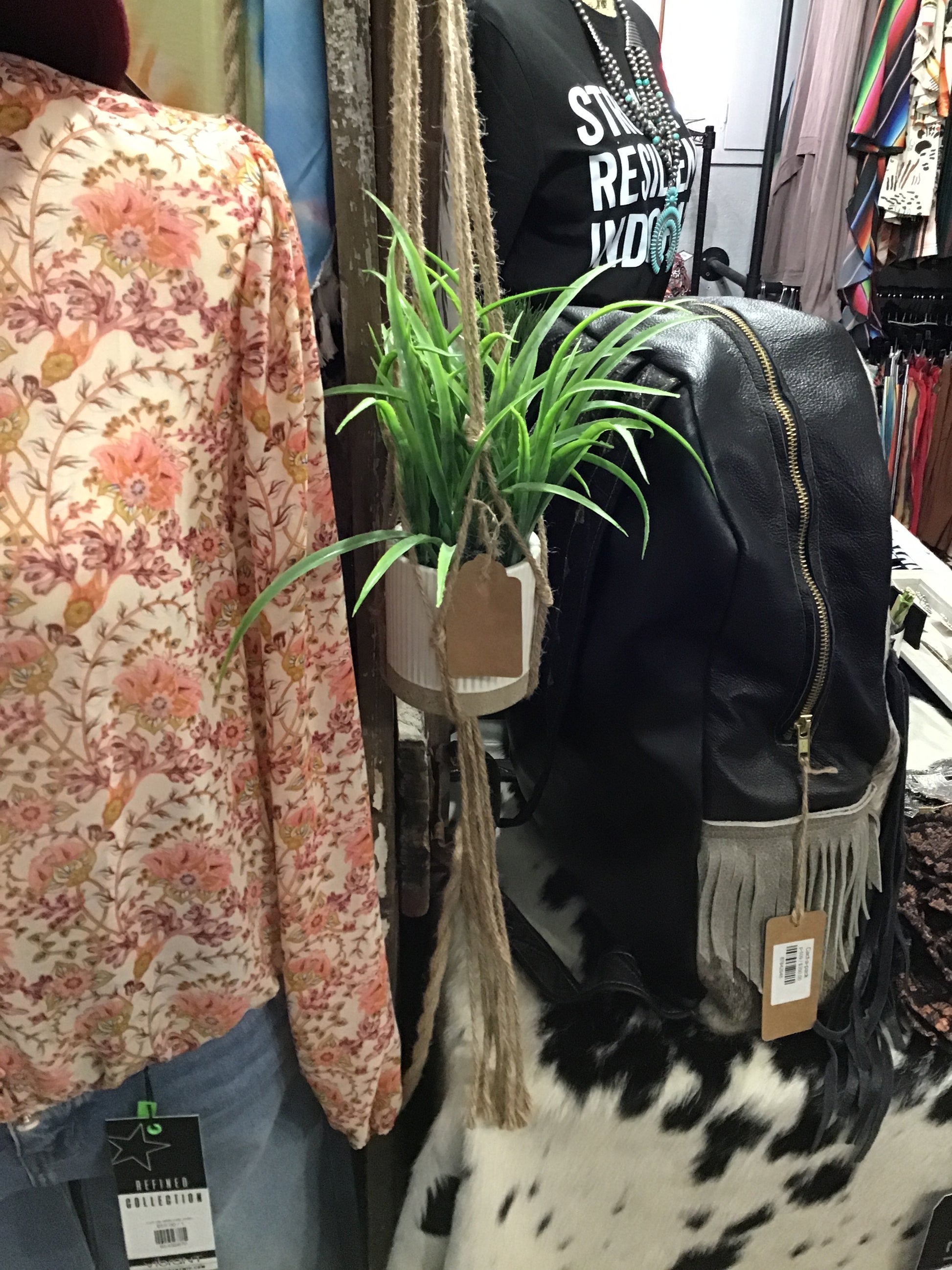 Plant holding wall hangers