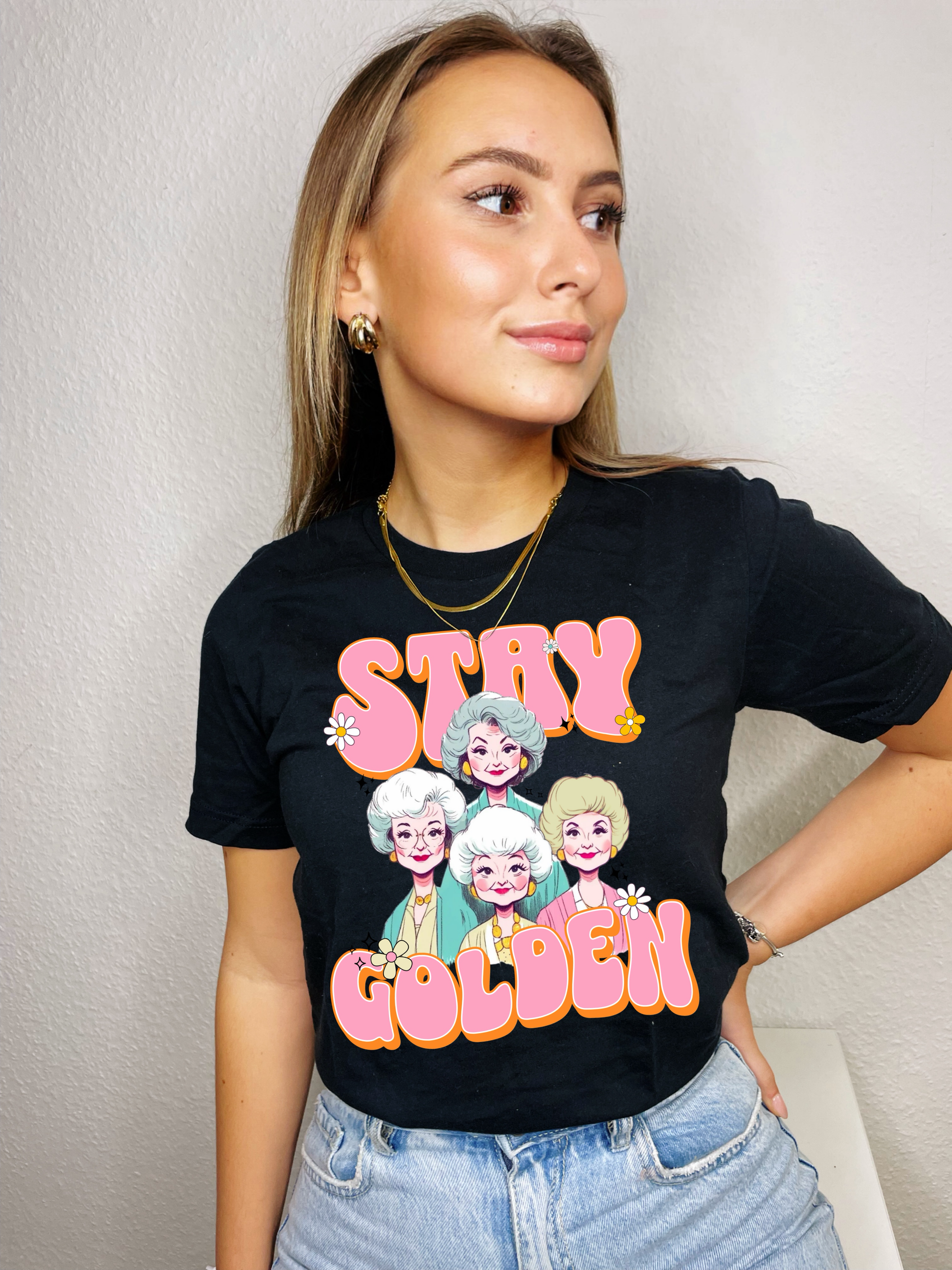Stay Golden Retro Girl Gang Graphic on Gildan Softstyle Black Shirt – Graphic Tee, Long Sleeve & Crewneck.
