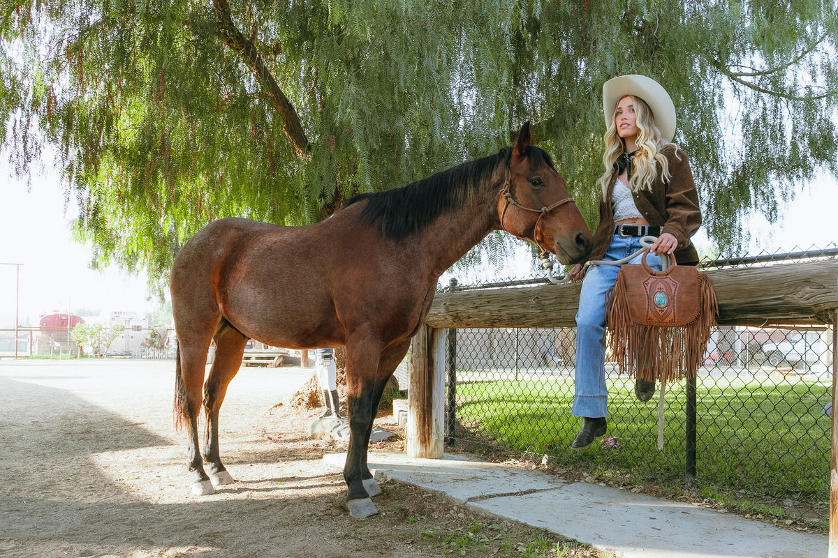 Sedona Tassle Bag In Saddle Brown