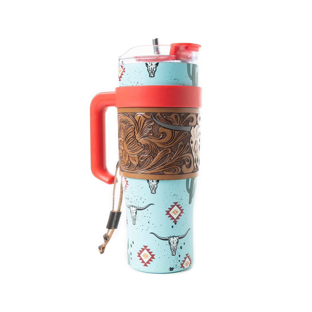 Myra Wide Wyoming Tumbler in sea blue with cowhide print and tooled leather design for everyday use