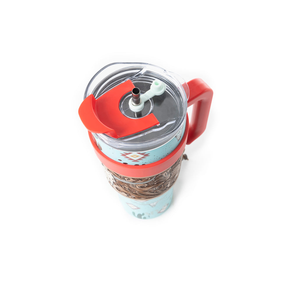 Myra Wide Wyoming Tumbler in sea blue with cowhide print and tooled leather design for everyday use