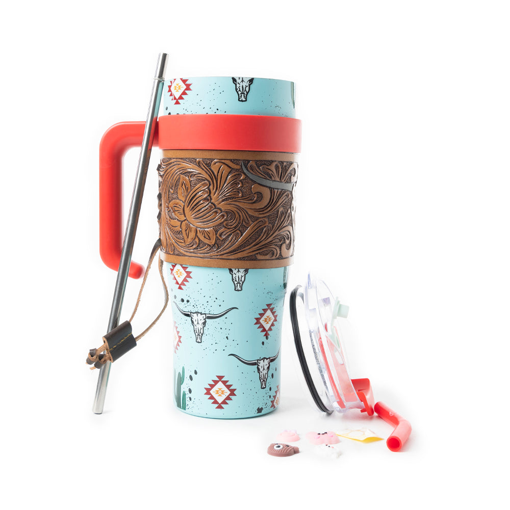 Myra Wide Wyoming Tumbler in sea blue with cowhide print and tooled leather design for everyday use