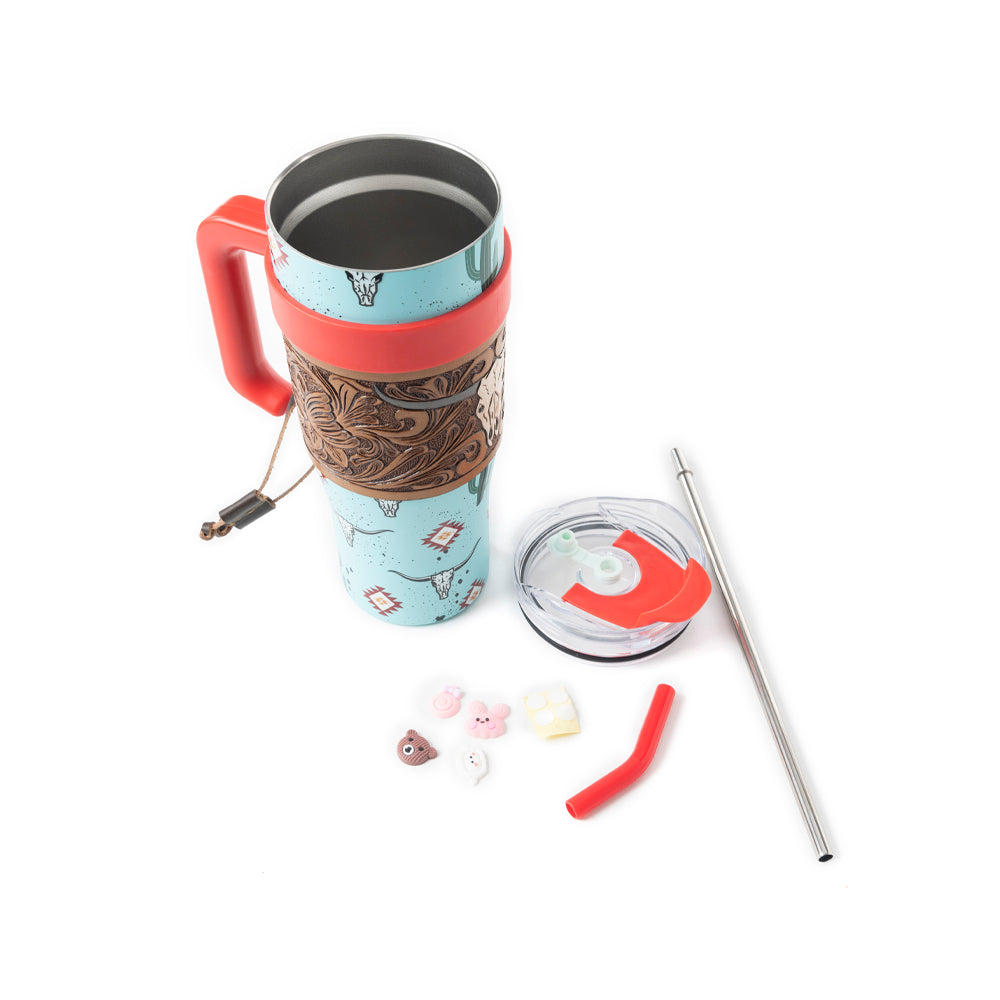 Myra Wide Wyoming Tumbler in sea blue with cowhide print and tooled leather design for everyday use