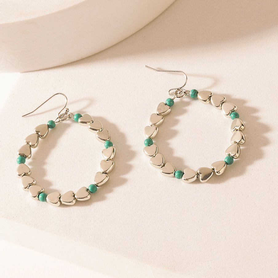 Myra Trail of Hearts Hoop Earrings in Arctic Silver