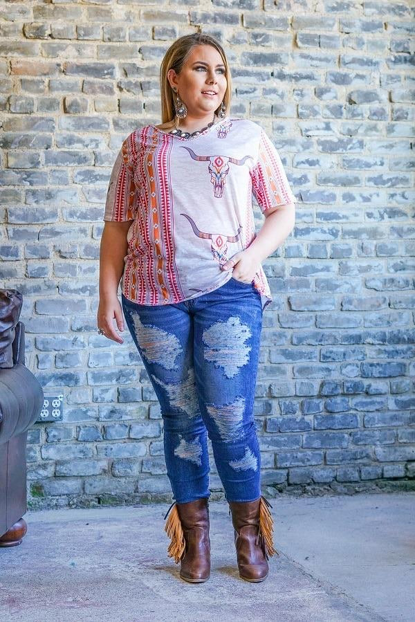 Distressed midrise skinny jean